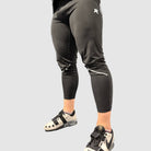 Close-up of Super Weightlifting Second Pull Tights — black performance leggings engineered for perfect bar contact.
